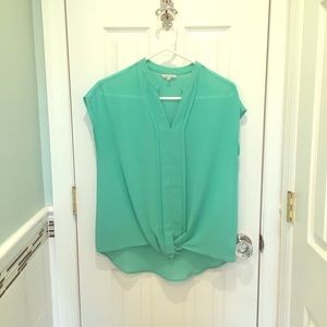 Sheer green blouse w pleated design.